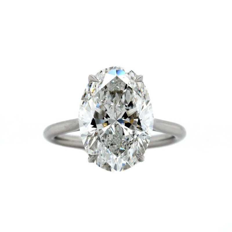 Platinum 4 Prong Cathedral Mounted Oval Diamond Engagement Ring